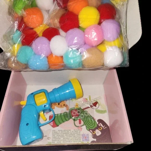 Perfect Cat Toy! This Comes With So Many Pom Pom Balls & Toy Gun That Shoots Em! - Picture 2 of 3